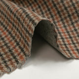 Drap de laine mélangée pied-de-poule marron et rouille fond beige