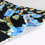 Viscose imprimée bouquet bleu royal fond noir