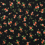 Maille Milano imprimée pluie de roses fond noir