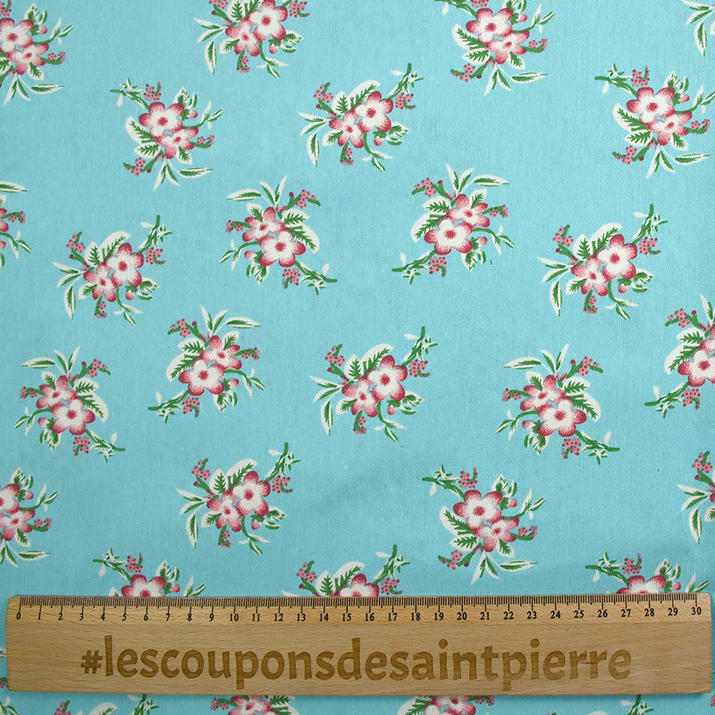 Sergé de coton imprimé petites fleurs fond azur