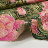 Golden brocade with pink flowers green background