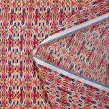 Mousseline imprimée Noémie bleu et fuchsia fond blanc cassé