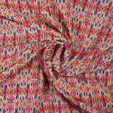 Mousseline imprimée Noémie bleu et fuchsia fond blanc cassé