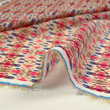 Mousseline imprimée Noémie bleu et fuchsia fond blanc cassé