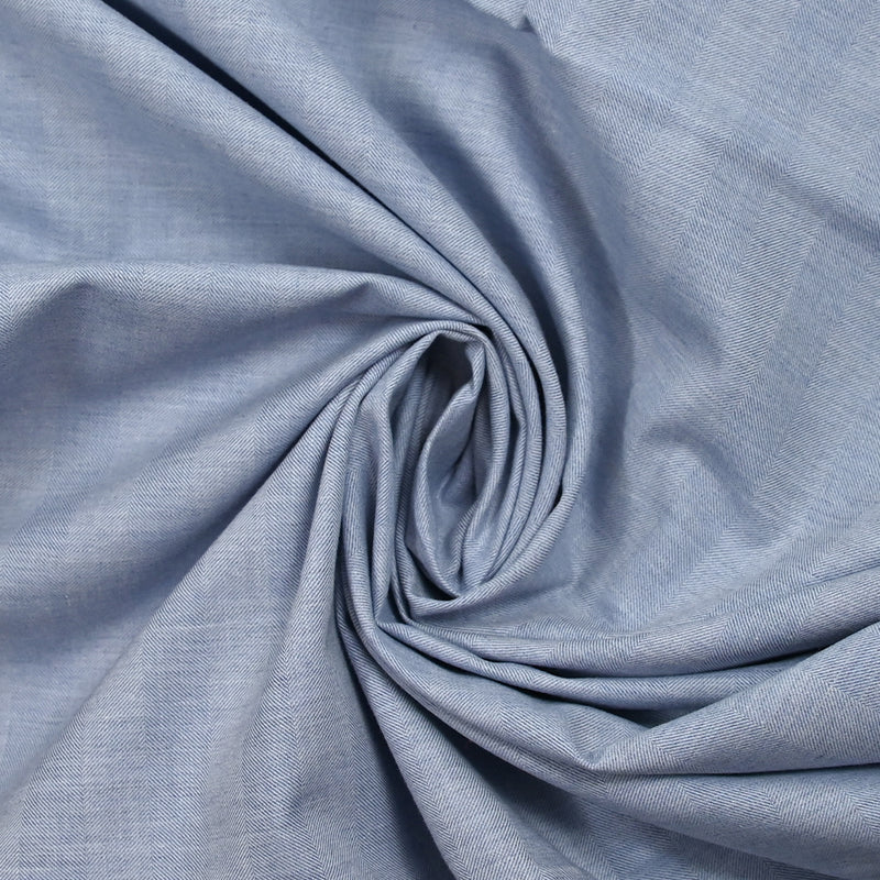 Coton tissé teint rayé chevrons bleu ciel chiné