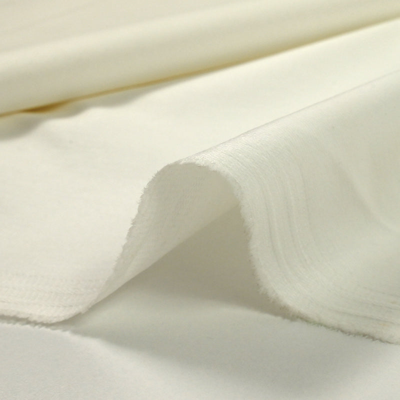Sergé de coton élasthanne blanc cassé
