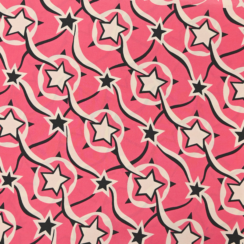 Crêpe de chine en soie imprimé étoile fond rose