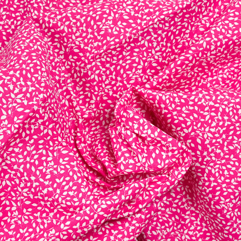 Cotton poplin printed foliage fuchsia background