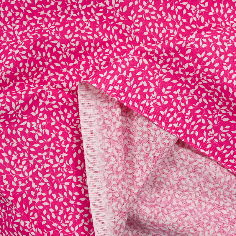 Cotton poplin printed foliage fuchsia background