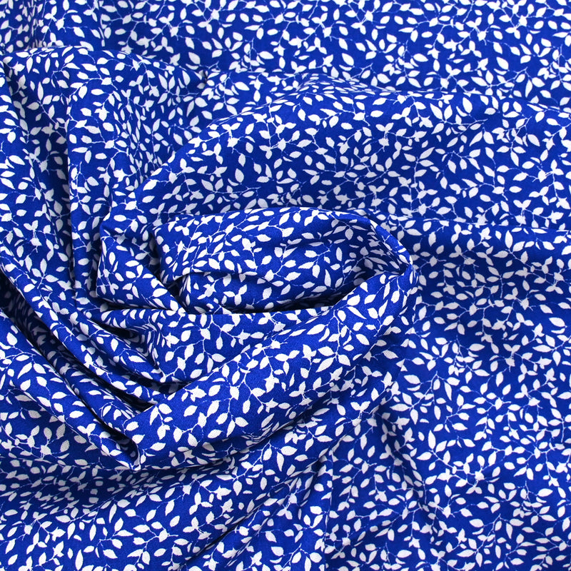 Cotton poplin printed blue background foliage