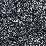 Cotton poplin printed foliage black background