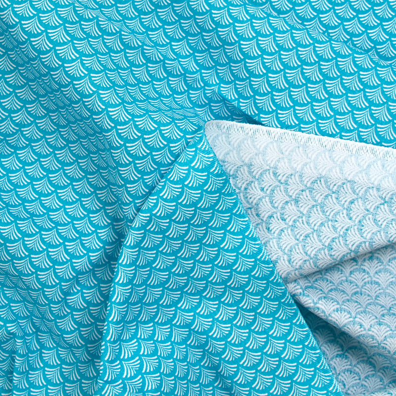 Cotton poplin printed shell turquoise background