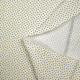 Coton élasthanne imprimé à pois bleu fond écru