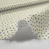 Coton élasthanne imprimé à pois bleu fond écru