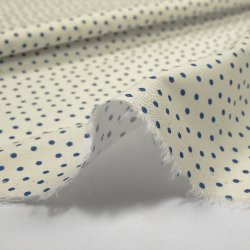 Coton élasthanne imprimé à pois bleu fond écru