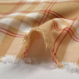 Voile de coton tissé teint à carreaux fond chair