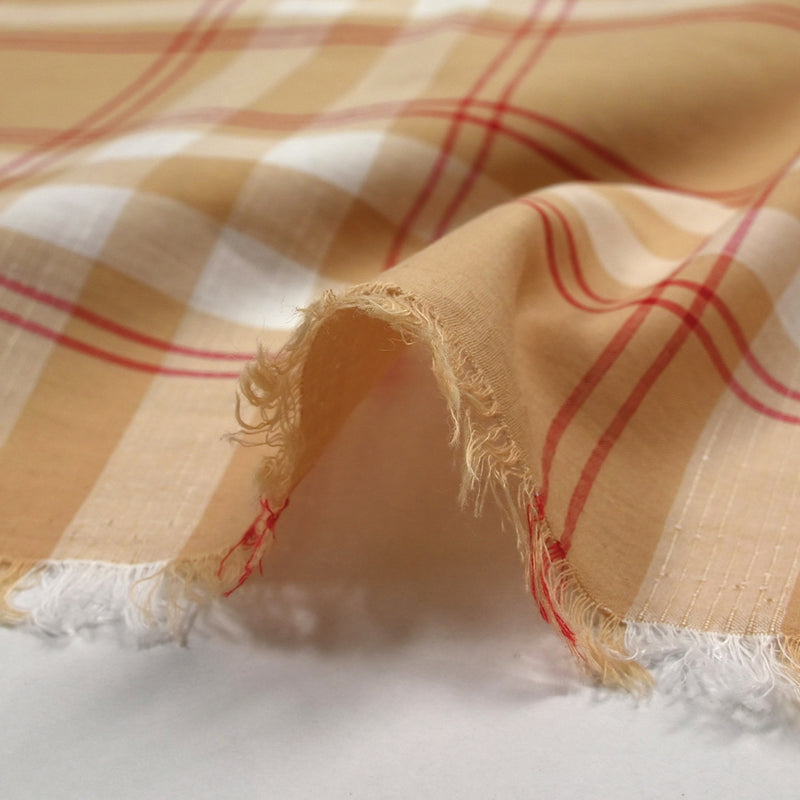 Voile de coton tissé teint à carreaux fond chair