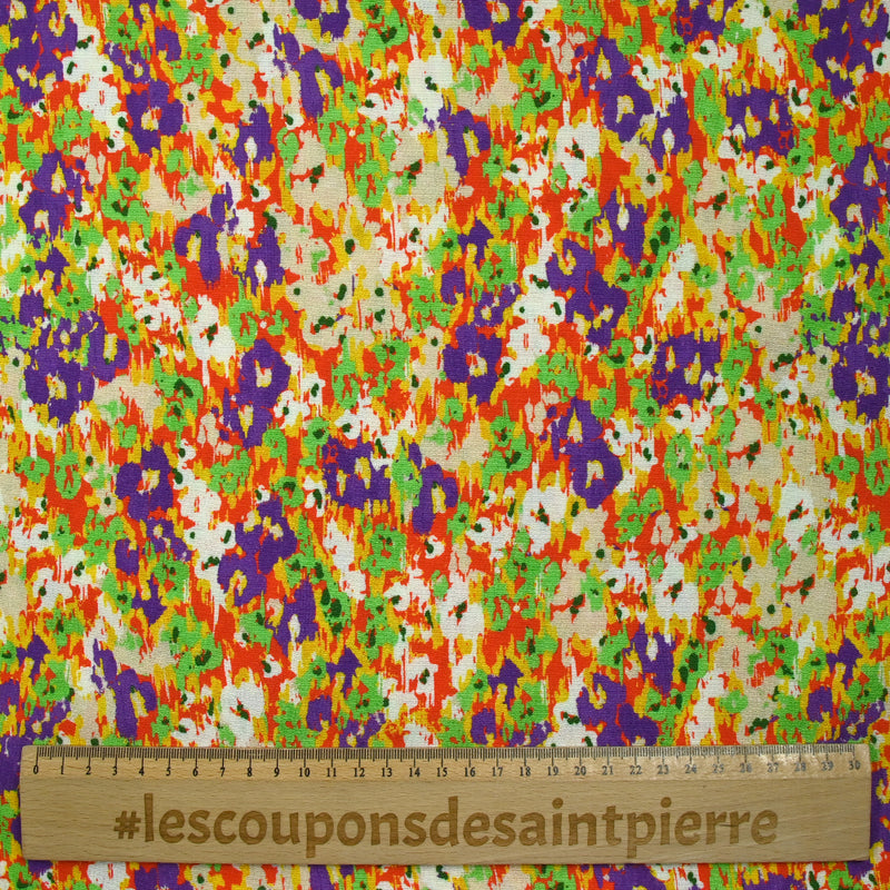 Crépon de viscose imprimé pensée floue violet et vert fond orange