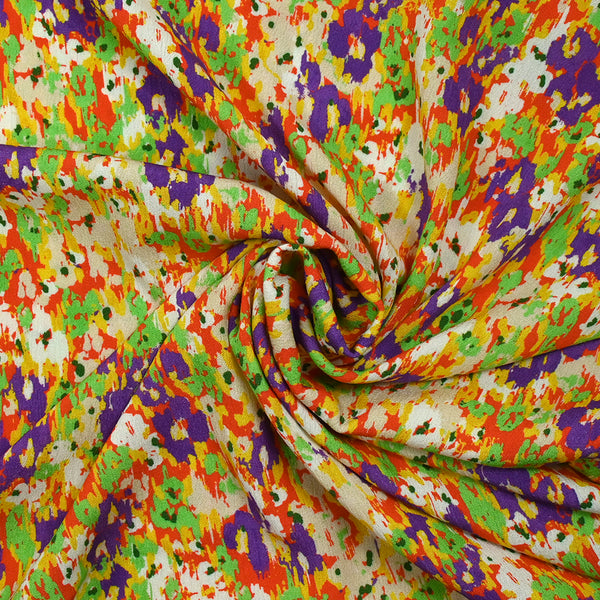 Crépon de viscose imprimé pensée floue violet et vert fond orange