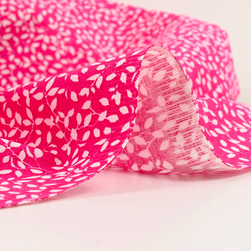 Cotton poplin printed foliage fuchsia background