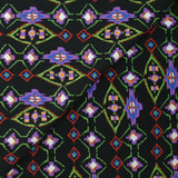 Crêpe viscose imprimé éclat mystique violet et vert fond noir