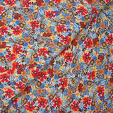 Crépon viscose lurex fleurs du dimanche rouge fond blanc