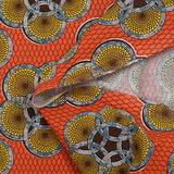 Coton imprimé ethnique Uden jaune fond orange