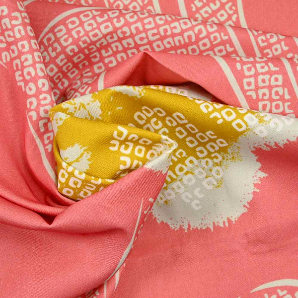 Sergé de coton imprimé fleurs fond framboise glacé
