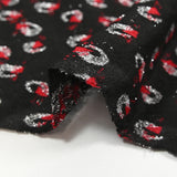 Maille lurex spirale rouge et argent fond noir