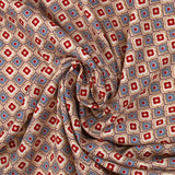 Viscose imprimée fleurs graphiques bordeaux fond beige rosé