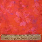 Jacquard de viscose satiné imprimé taches florales fond orange