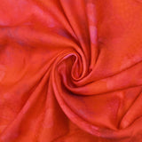 Jacquard de viscose satiné imprimé taches florales fond orange