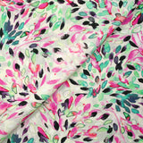 Viscose imprimée encre de feuilles turquoise et rose fond blanc