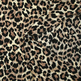 Microfibre imprimée polyester flou sauvage fond écru et marron