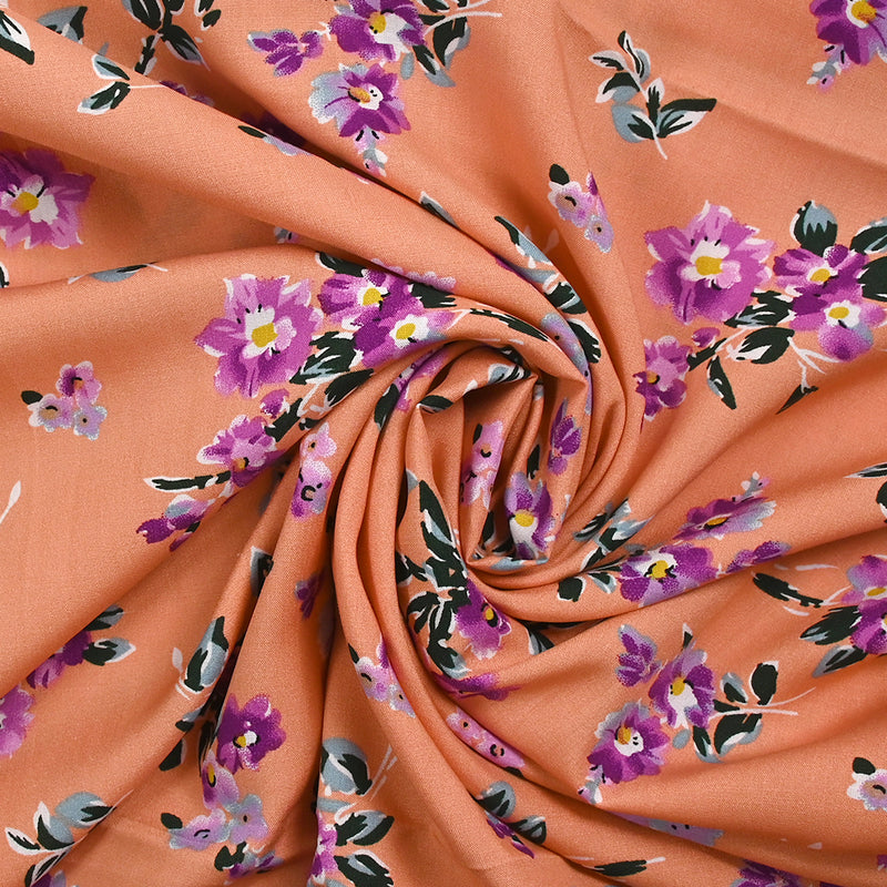 Viscose imprimée fleurs Hibiscus fond orange