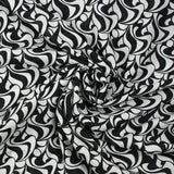 Voile de viscose satiné imprimé écume noir et blanc
