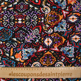 Viscose imprimée frénésie orange, rouge et violet fond noir