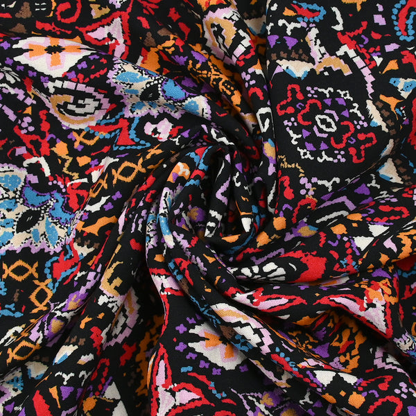 Viscose imprimée frénésie orange, rouge et violet fond noir
