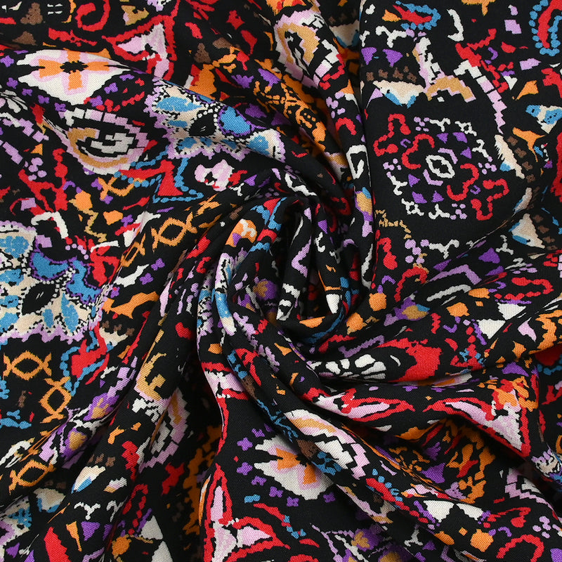 Viscose imprimée frénésie orange, rouge et violet fond noir