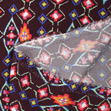 Crêpe viscose imprimé éclat mystique fuchsia et vert d'eau fond lie de vin
