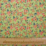 Viscose imprimée fleurs Pétunia fond vert