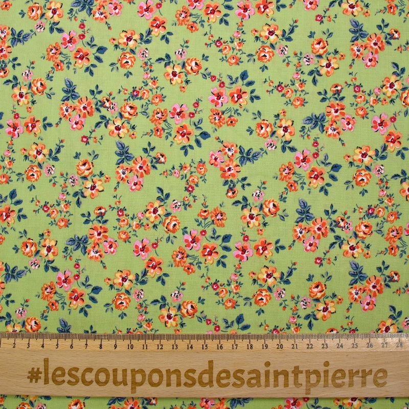 Viscose imprimée fleurs Pétunia fond vert