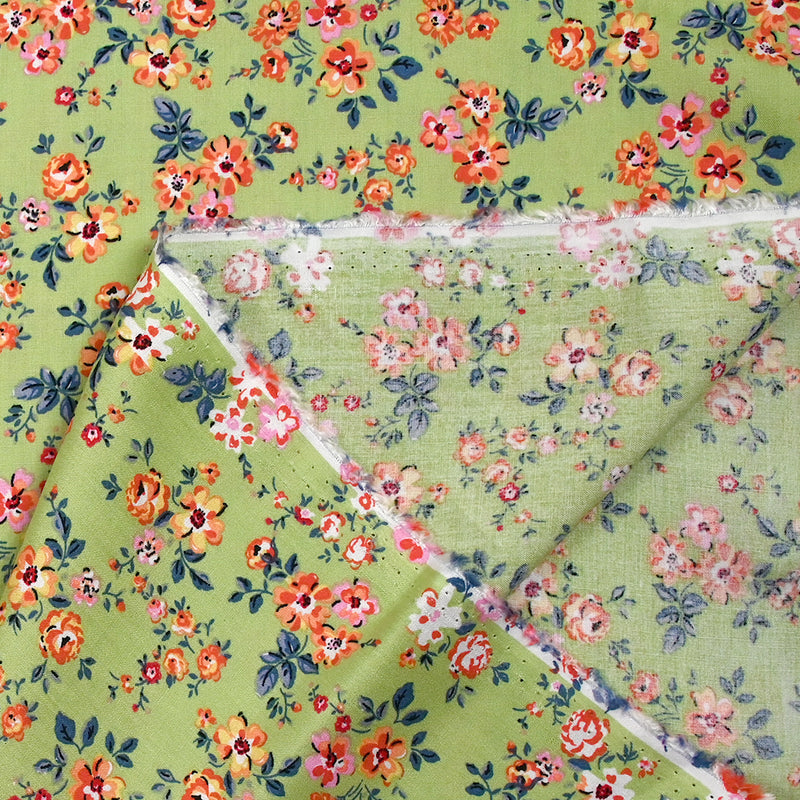 Viscose imprimée fleurs Pétunia fond vert