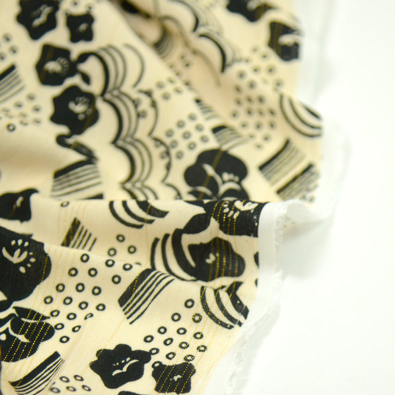 Crêpe de viscose rayé irisé fleurs noir fond vanille