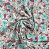 Viscose imprimée fleurs Narcissa fond taupe