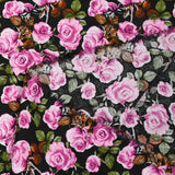 Viscose imprimée fleurs Poppy magenta fond noir