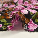 Viscose imprimée fleurs Poppy magenta fond noir