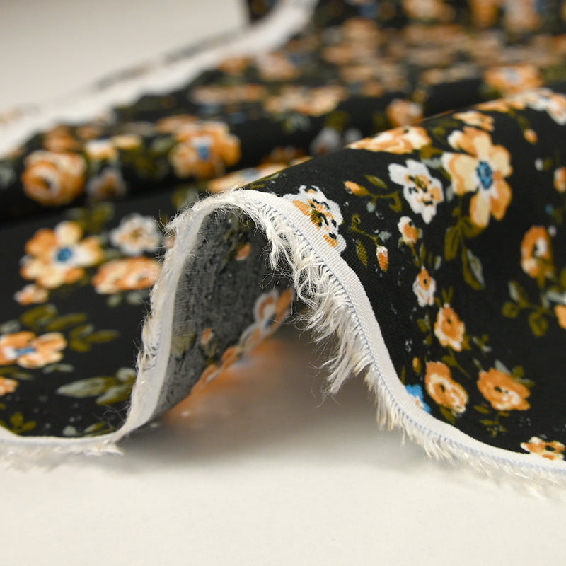 Viscose imprimée fleurs Pétunia fond noir