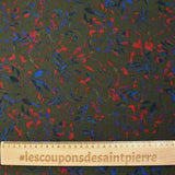 Crinkle muslin printed in royal blue and red with khaki background