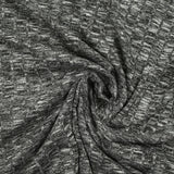 Maille côtelée chinée fine noir et blanc